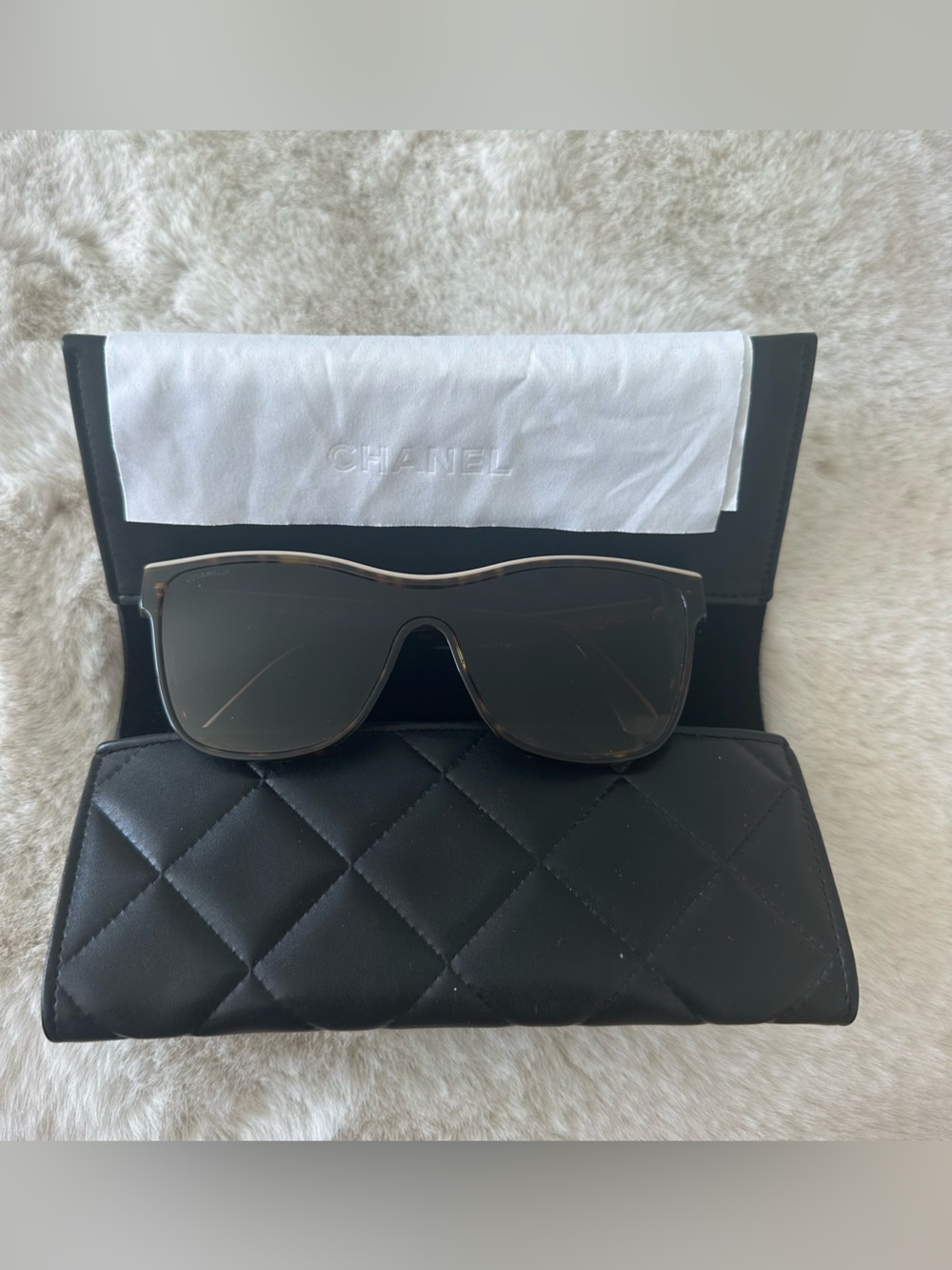 CHANEL Tortoise sunglasses with tan Chanel on frame. Comes with box. Like new.